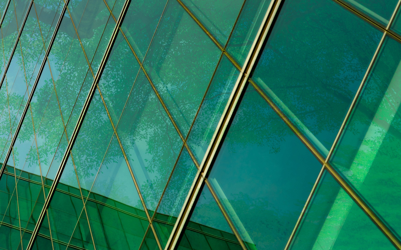 geometric pattern of a modern glass building facade